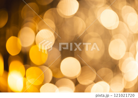 Yellow bokeh lights with copy space on dark background 121021720