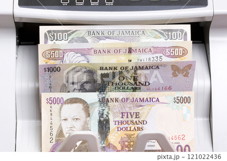 Jamaican dollar in the counting machine 121022436