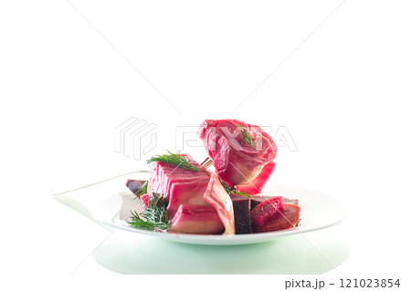 pickled cabbage with beets and carrots, in a plate, isolated on white background pickled cabbage with beets and carrots, in a plate, isolated on white background 121023854