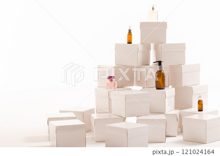 Boxes with beauty products and copy space over white background 121024164
