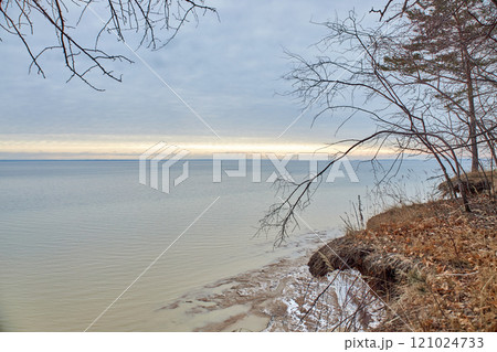 Novosibirsk reservoir, Ob Sea, artificial pond River bank. Sunset, blue clouds Novosibirsk reservoir, Ob Sea, artificial pond River bank. Sunset, blue clouds 121024733