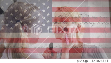American flag and constitution text against caucasian daughter doing makeup of her mother at home American flag and constitution text against caucasian daughter doing makeup of her mother at home 121026151