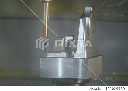 The CNC milling machine cutting mold part by solid ball nose end mill tool. The CNC milling machine cutting mold part by solid ball nose end mill tool. 121026380