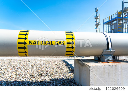 A detailed view of a natural gas pipeline emphasizing sustainable energy transport and industrial infrastructure A detailed view of a natural gas pipeline emphasizing sustainable energy transport and industrial infrastructure 121026609