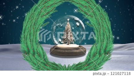 Image of fir tree wreath over snow globe and winter landscape 121027118