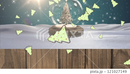 Image of snow falling and trees over snow globe with tree on blue background 121027149