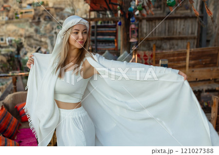 Portrait of a beautiful woman in Arabic clothing in Egypt during sunset. 121027388