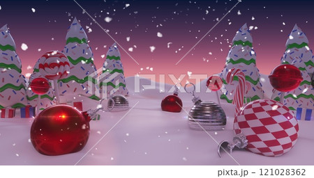 Image of Merry Christmas written in shiny letter on snowy landscape with Christmas balls 121028362