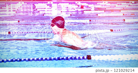 Swimmer swimming in the pool 121029214
