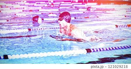 Swimmers swimming in the pool Swimmers swimming in the pool 121029218