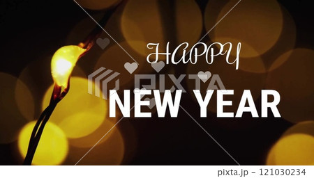 Image of happy new year text over yellow bokeh lights on black background 121030234