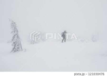 difficult weather conditions, a lone photographer difficult weather conditions, a lone photographer 121030476