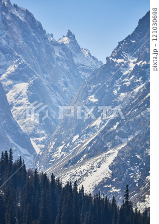 Snowy mountain peaks, rock 121030698
