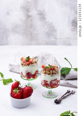 Dessert with strawberry, yogurt and granola Dessert with strawberry, yogurt and granola 121031134