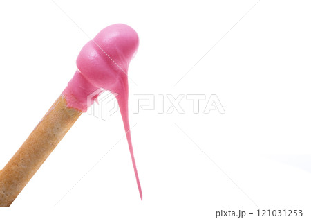 biscuit stick with pink cream isolated biscuit stick with pink cream isolated 121031253