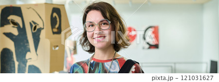 Young female artist in stylish outfit 121031627