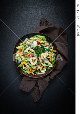 salad with squid, fresh cucumber, eggs, sweet pepper, red onion, with dressing, homemade, no people, 121031826