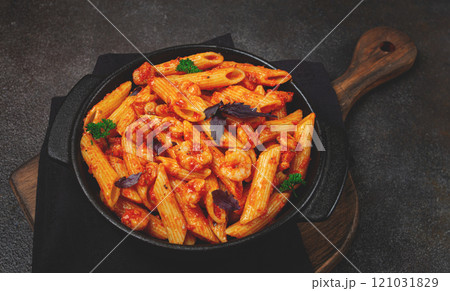 Penne pasta, with shrimp in tomato sauce, close-up, no people, Penne pasta, with shrimp in tomato sauce, close-up, no people, 121031829