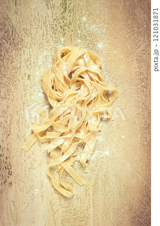 raw tagliatelli pasta , homemade, top view, no people, rustic, food concept, 121031871