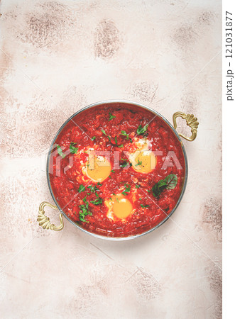 shakshuka, breakfast, fried eggs in tomato sauce, with spices and herbs, homemade, no people, 121031877