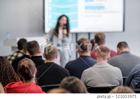 Professional speaker presenting to an attentive audience at a conference Professional speaker presenting to an attentive audience at a conference 121031975