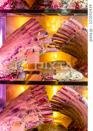 view of many beef ribs in dry aging fridge view of many beef ribs in dry aging fridge 121032434