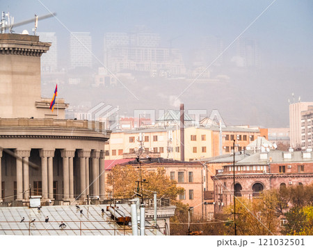 pink air in rain over Yerevan city in autumn 121032501