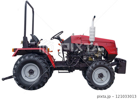Mini tractor isolate. Farm tractor for agricultural work on empty background Mini tractor isolate. Farm tractor for agricultural work on empty background 121033013