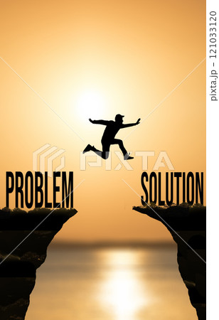 Solution and problem concept. Man jumping from problem to solution in business Solution and problem concept. Man jumping from problem to solution in business 121033120