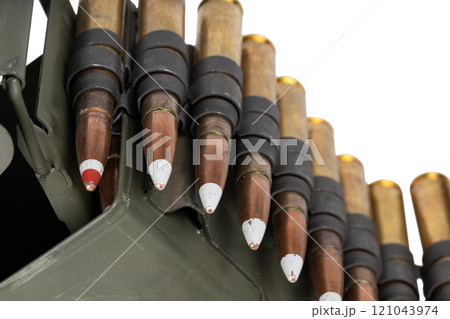 .50 BMG caliber machine gun ammunition belt with cartridges in ammunition can. .50 BMG caliber machine gun ammunition belt with cartridges in ammunition can. 121043974