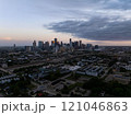 Captivating Houston skyline set against a stunning twilight cloudscape with warm tones, highlighting the city's dynamic urban landscape and contemporary infrastructure 121046863