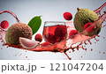 Lychee juice splashing with fresh fruits and leaves 121047204
