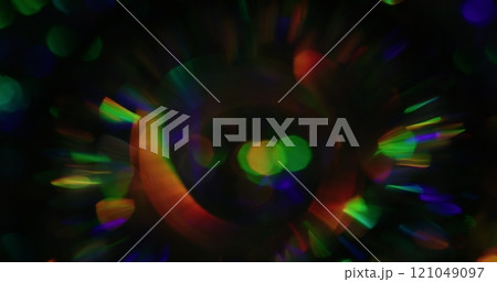 Bokeh crystal. Blur kaleidoscope light. Defocused leak multicolor green yellow rays rainbow flickers beam lens flare on abstract art background. Bokeh crystal. Blur kaleidoscope light. Defocused leak multicolor green yellow rays rainbow flickers beam lens flare on abstract art background. 121049097