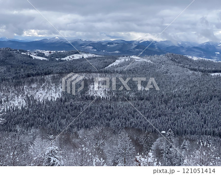 Snowy Mountain Landscape Under Cloudy Sky Snowy Mountain Landscape Under Cloudy Sky 121051414