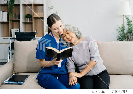 Caregiver doctor examine older patient use blood pressure gauge. woman therapist nurse at nursing home taking care of senior elderly woman Caregiver doctor examine older patient use blood pressure gauge. woman therapist nurse at nursing home taking care of senior elderly woman 121052922