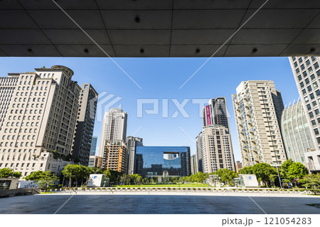 View of the park and surrounding modern buildings in front of Taichung City Council, Taiwan. 121054283