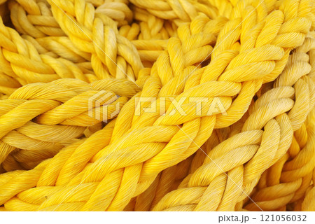 Yellow rope. Strong and colorful rope. 121056032
