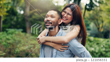Japan, outdoor and couple with piggy back, love and bonding together with relationship. Romance, care and man carrying woman with trust, smile and marriage with nature, travel and commitment 121056331