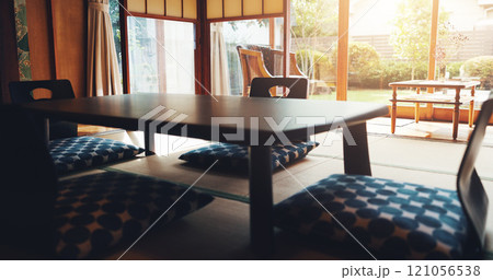 Dining, table and Japanese interior design with floor chair with Asian culture for mindfulness in home. Retro, empty room and minimalist with low wood furniture and mat with creative architecture Dining, table and Japanese interior design with floor chair with Asian culture for mindfulness in home. Retro, empty room and minimalist with low wood furniture and mat with creative architecture 121056538