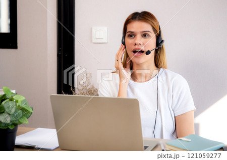 Professional young business woman working and meeting online in modern home office. 121059277