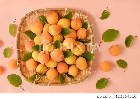 Fresh ripe sweet apricots, summer or autumn farm harvest, healthy diet vegetarian food, selective focus, shallow DOF Fresh ripe sweet apricots, summer or autumn farm harvest, healthy diet vegetarian food, selective focus, shallow DOF 121059516