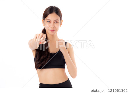 Portrait young asian woman in sportswear exercise with cardio pose while punch isolated. Portrait young asian woman in sportswear exercise with cardio pose while punch isolated. 121061562