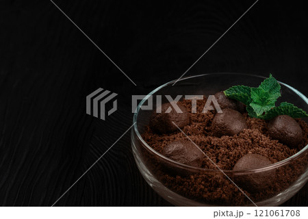 Chocolate dessert of cookies with pieces of chocolate colored in Mocha mousse color of 2025 Chocolate dessert of cookies with pieces of chocolate colored in Mocha mousse color of 2025 121061708
