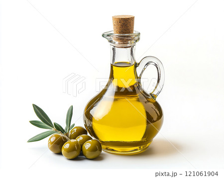 Olive oil in a glass bottle with olives isolated on a white background 121061904