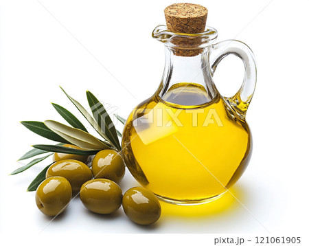 Olive oil in a glass bottle with olives isolated on a white background 121061905