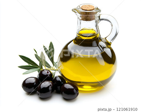 Olive oil in a glass bottle with olives isolated on a white background 121061910