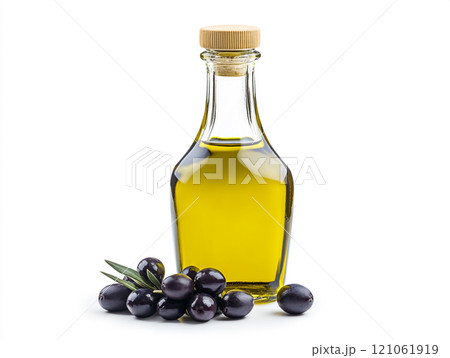 Olive oil in a glass bottle with olives isolated on a white background 121061919