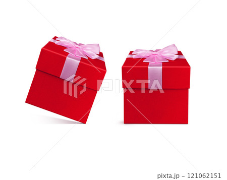 Red gift box tied with a pink bow on a white background. 121062151
