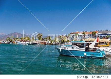 Pleasure motor boats and yachts are moored at Fethiye marina Pleasure motor boats and yachts are moored at Fethiye marina 121064384