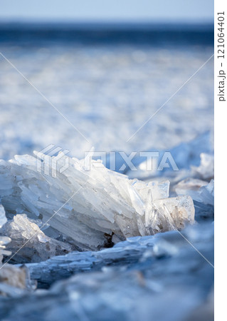 Ice shards close-up photo with selective soft focus and frozen ice 121064401